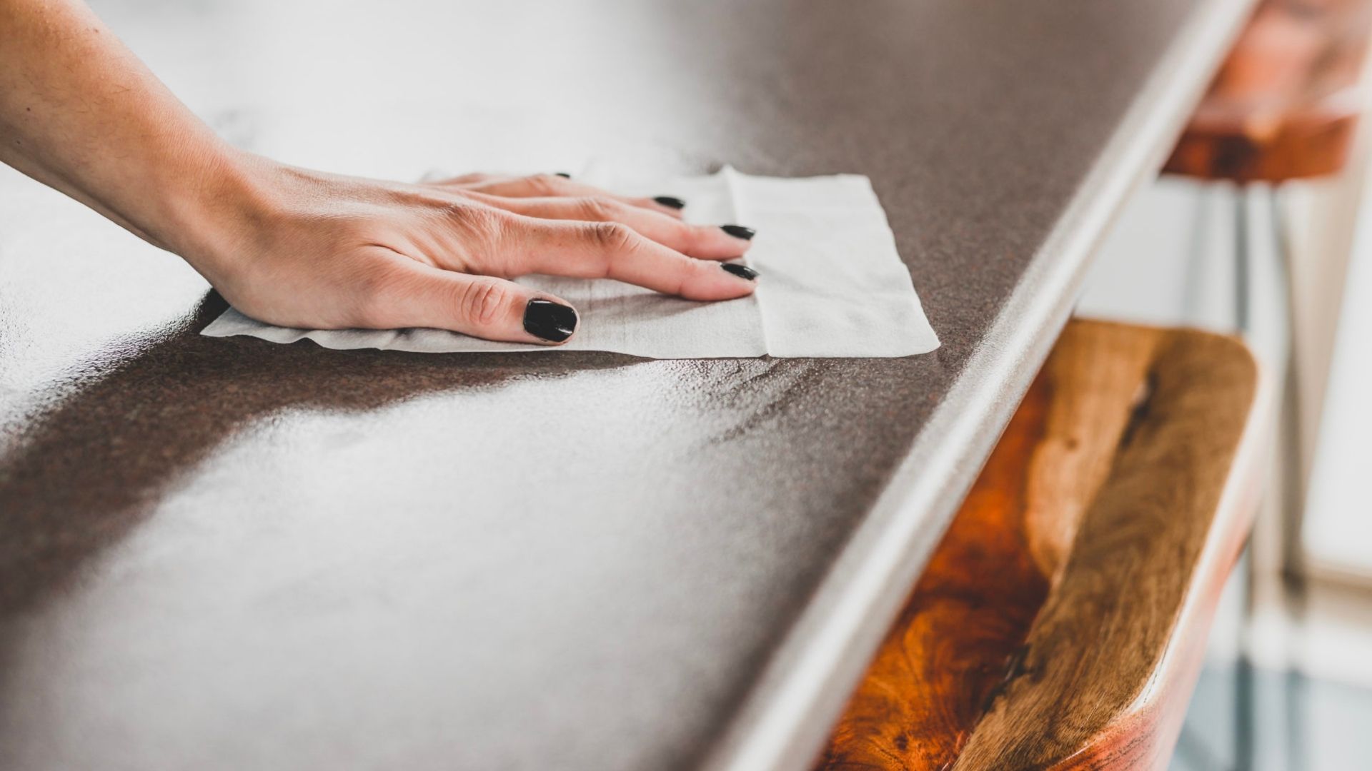 Hand Wiping Benchtop Black Fingernails